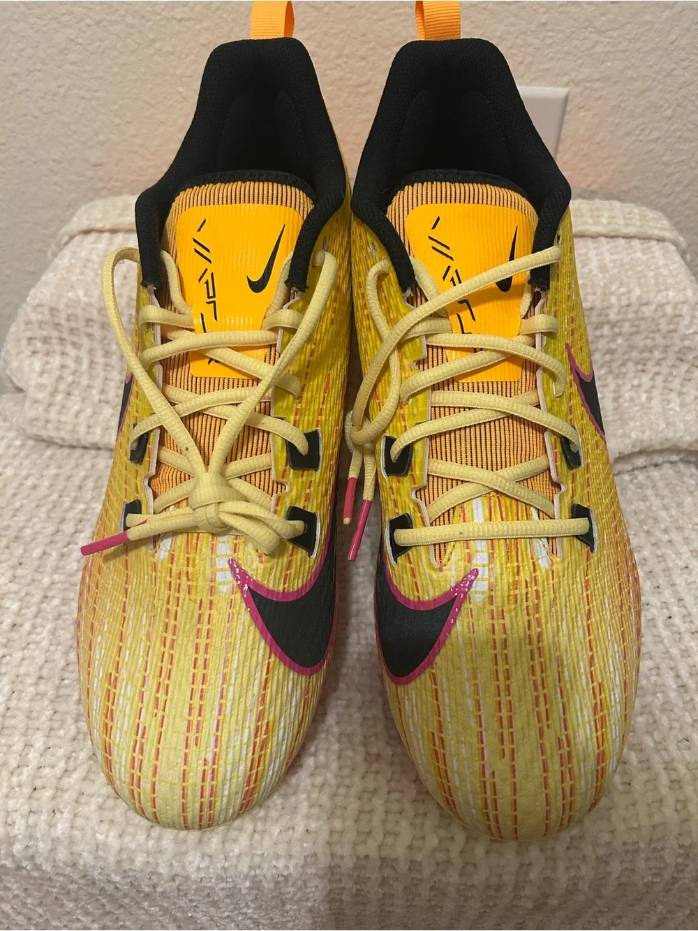 Nike Yellow and Black Athletic Sneakers with Pink Swoosh